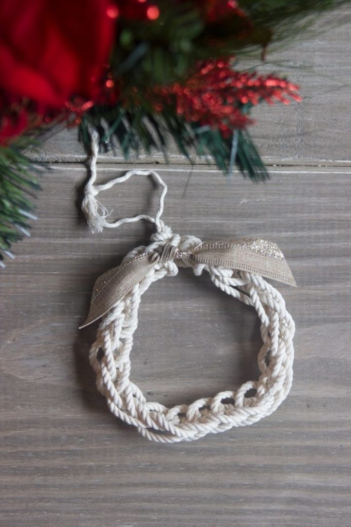 Easy finger-knitted wreath ornament, perfect craft for kids! | www.PracticallyHIppie.com