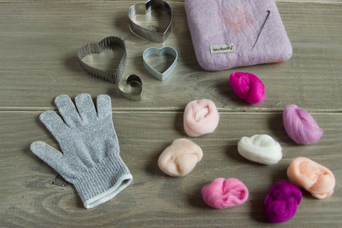 Needle felted hearts with cookie cutters with an instructional story