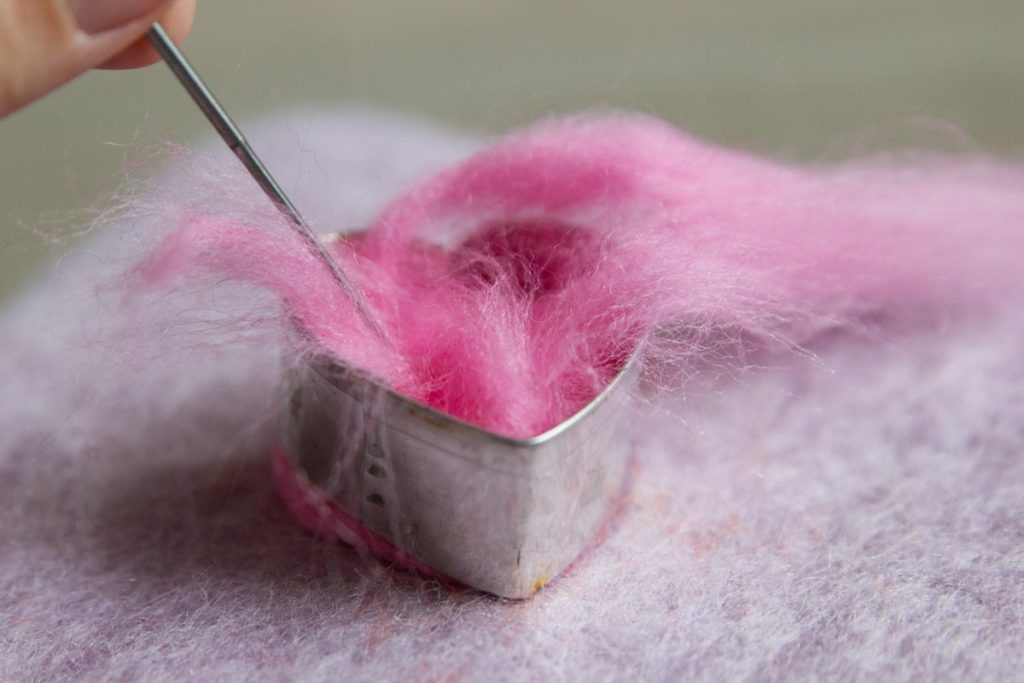 needle felted hearts with cookie cutters and an instructional story for kids