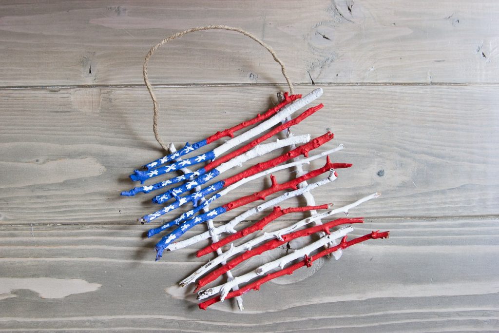 Painted stick flags, great nature craft for kids for 4th of July or Memorial Day #4thofjuly #craftsforkids