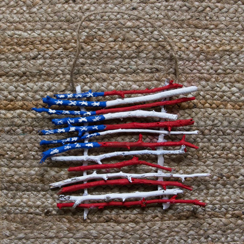 Painted stick flags | nature-inspired 4th of July craft for kids