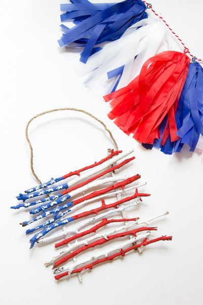 Painted stick flags, great nature craft for kids for 4th of July or Memorial Day #4thofjuly #craftsforkids